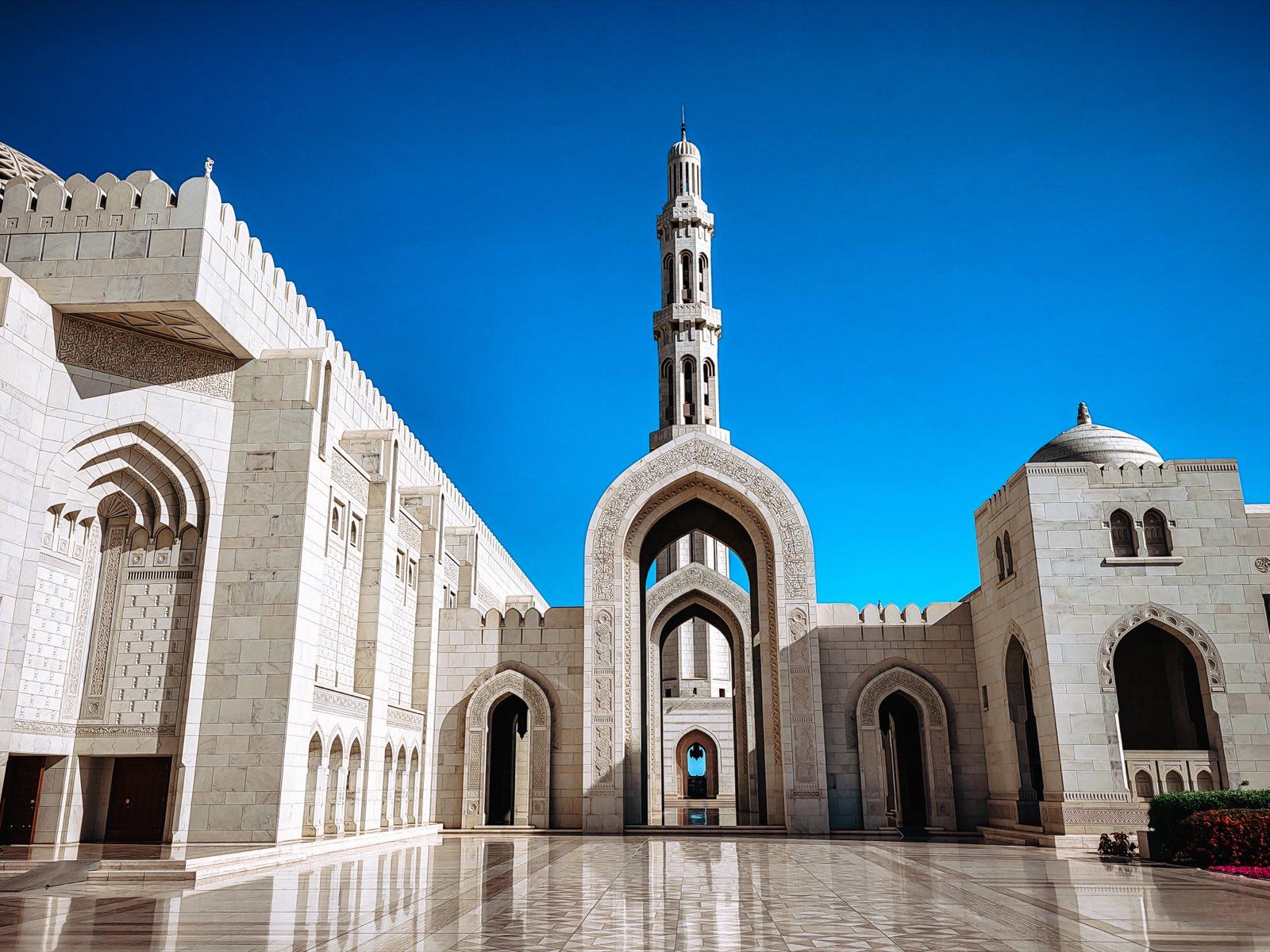 Sultan Qaboos Grand Mosque with its minaret in the morning sun