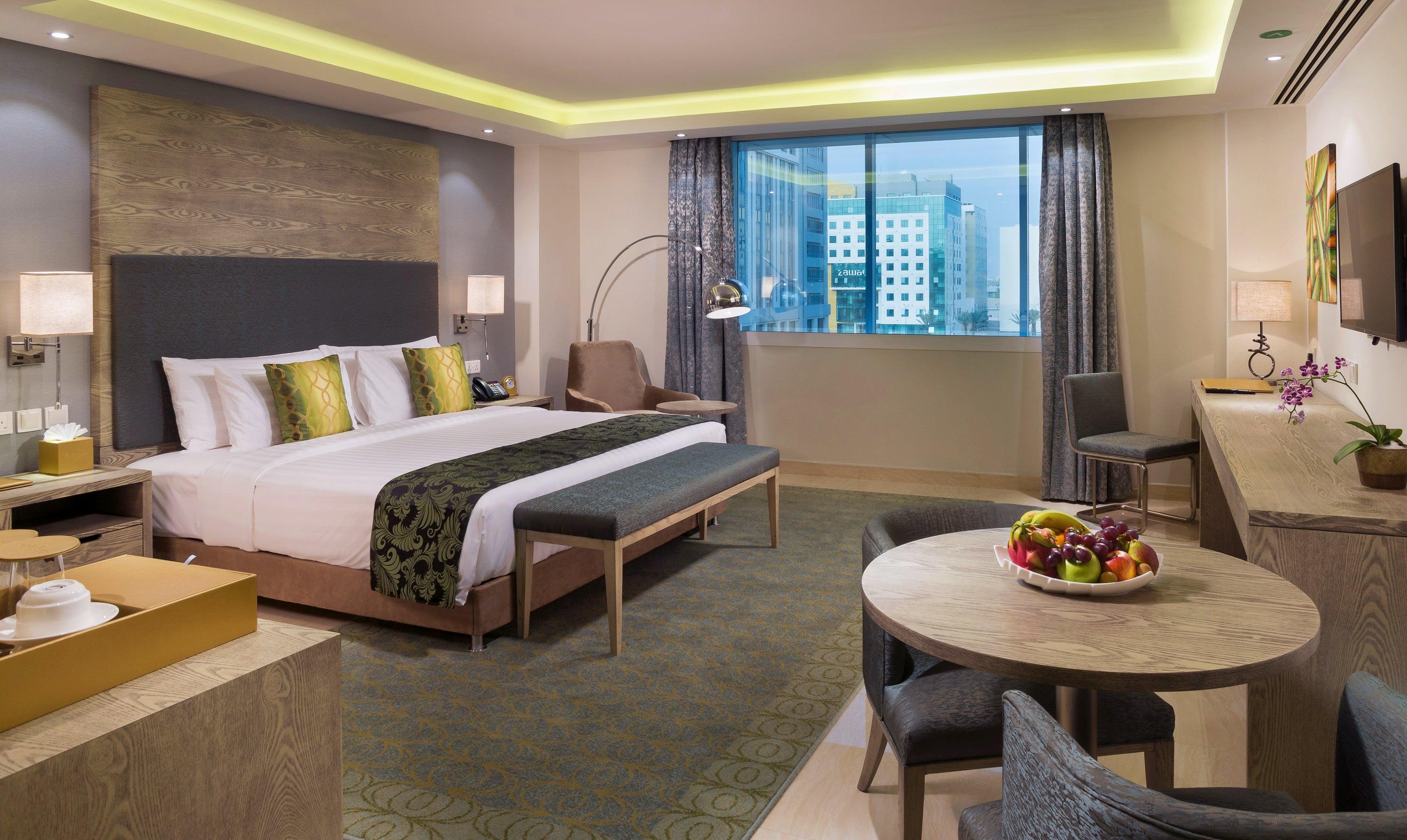 Spacious hotel room in Muscat with seating area