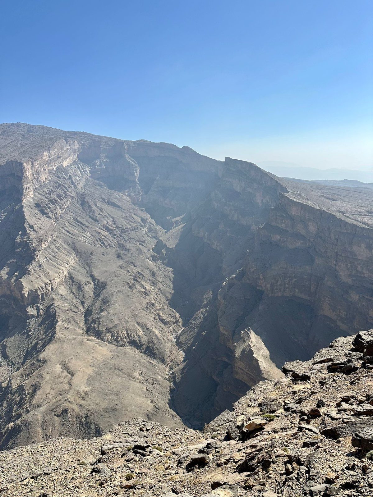 Sheer rock walls plunge hundreds of metres into the gorge