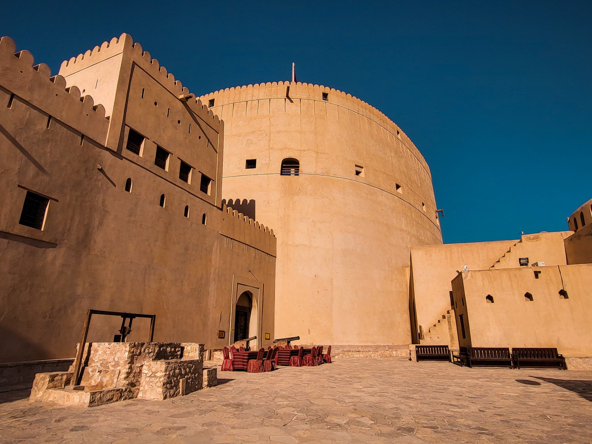 The round main tower of Nizwa Fort, seen from the courtyard